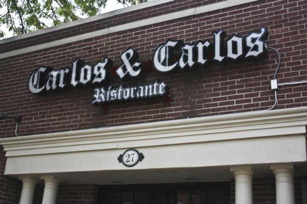 Carlos & Carlos Arlington Heights.  LED lighted channel letters on a raceway. 